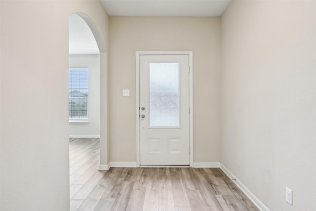 doorway with light hardwood / wood-style floors