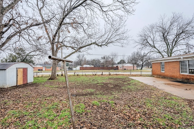 view of yard with a shed