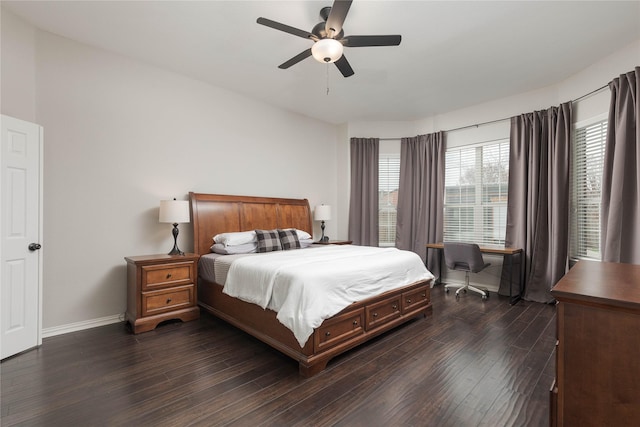 bedroom with dark wood-type flooring and ceiling fan