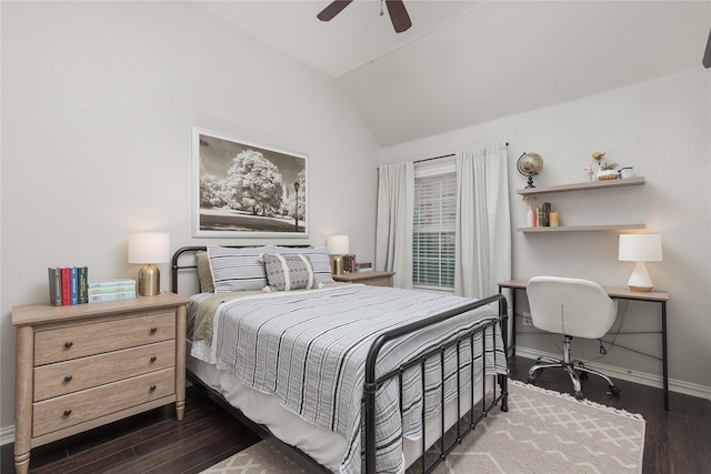 bedroom with vaulted ceiling, dark wood-type flooring, and ceiling fan