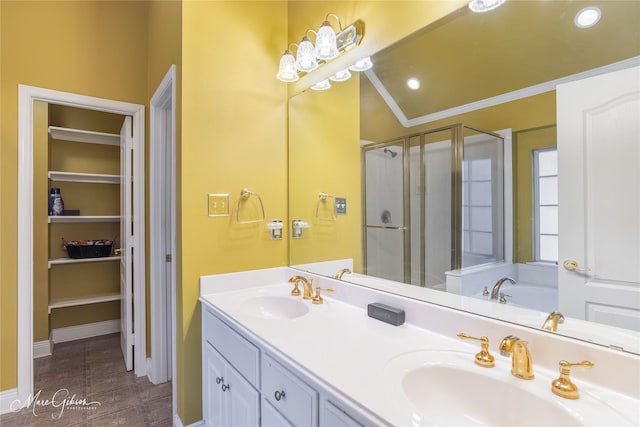 bathroom featuring tile patterned floors, vanity, independent shower and bath, and ornamental molding