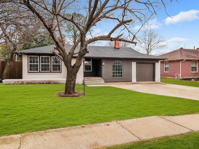 single story home featuring a garage and a front lawn