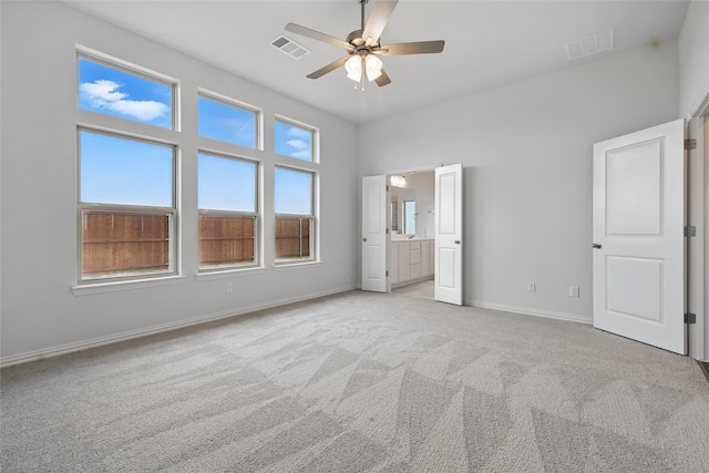16109 Garden Dr, Celina, TX 75009 - unfurnished bedroom featuring ensuite bath, visible vents, light colored carpet, and baseboards