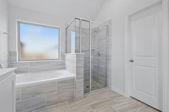 16109 Garden Dr, Celina, TX 75009 - full bath with a shower stall, vanity, and a garden tub