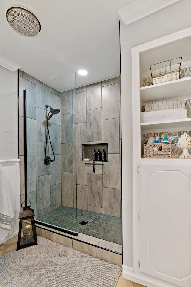 full bathroom with visible vents, walk in shower, wood finished floors, and recessed lighting