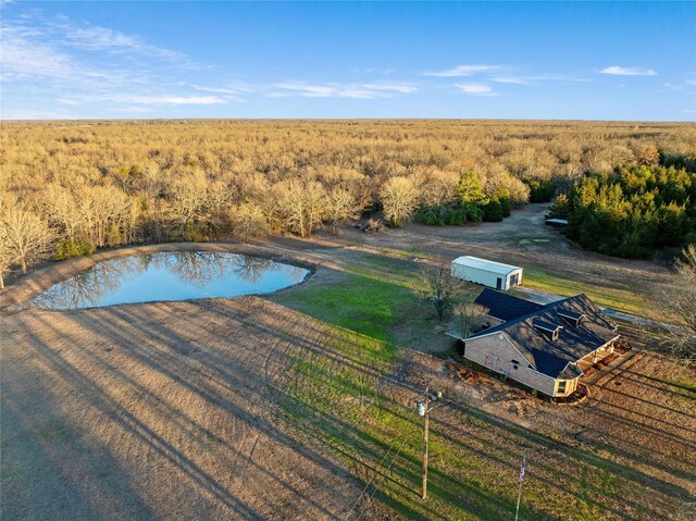 aerial view with a wooded view