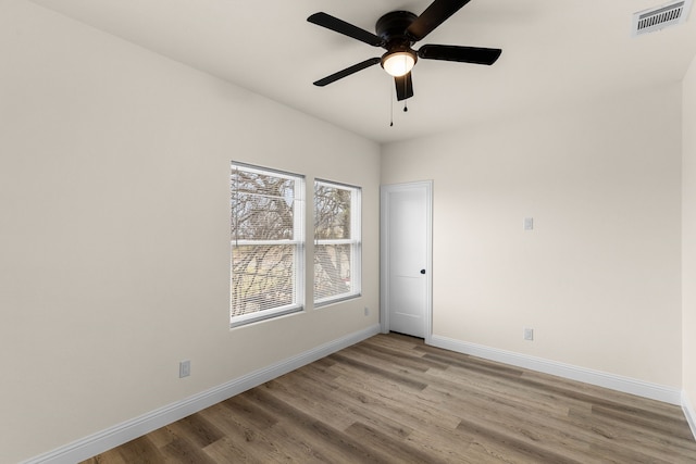 unfurnished room featuring ceiling fan and light hardwood / wood-style floors