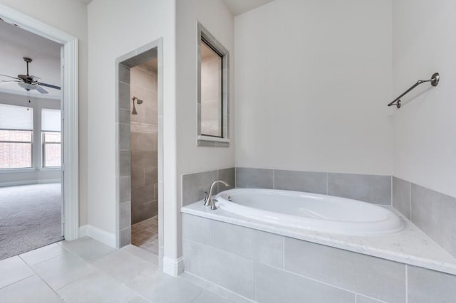 bathroom featuring ceiling fan, tile patterned floors, and independent shower and bath