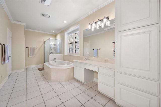 1604 Bridle Path, Corsicana, TX 75110 - ensuite bathroom featuring crown molding, ceiling fan, vanity, baseboards, and wood finished floors