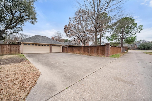 view of property exterior with a garage