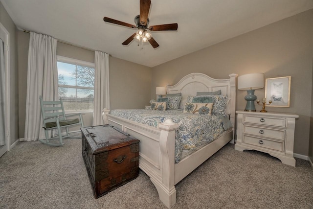 bedroom featuring ceiling fan and light carpet