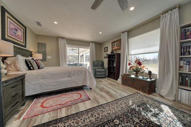 bedroom featuring light hardwood / wood-style flooring and ceiling fan