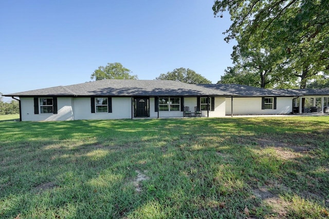 ranch-style house with a front yard