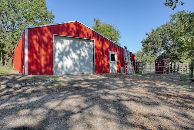 view of outbuilding with a garage