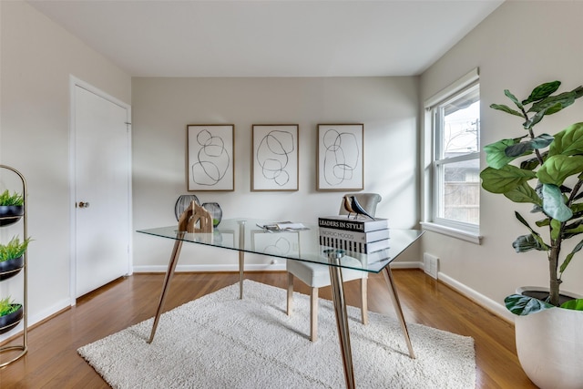 office space featuring hardwood / wood-style flooring