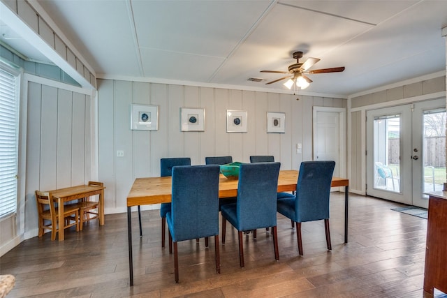 dining room with dark hardwood / wood-style floors, french doors, and ceiling fan