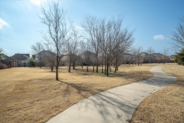 surrounding community featuring a lawn