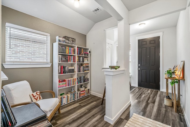 foyer entrance with dark wood-type flooring