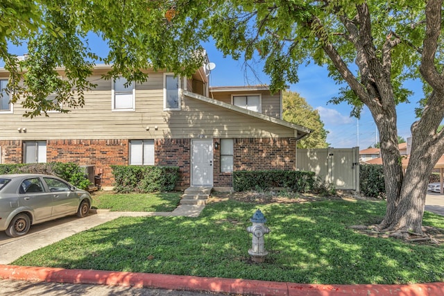 view of front of house with a front lawn