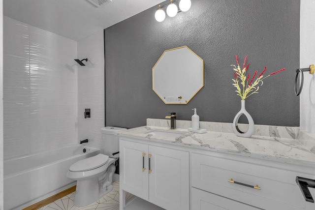 full bathroom with vanity, toilet, and  shower combination