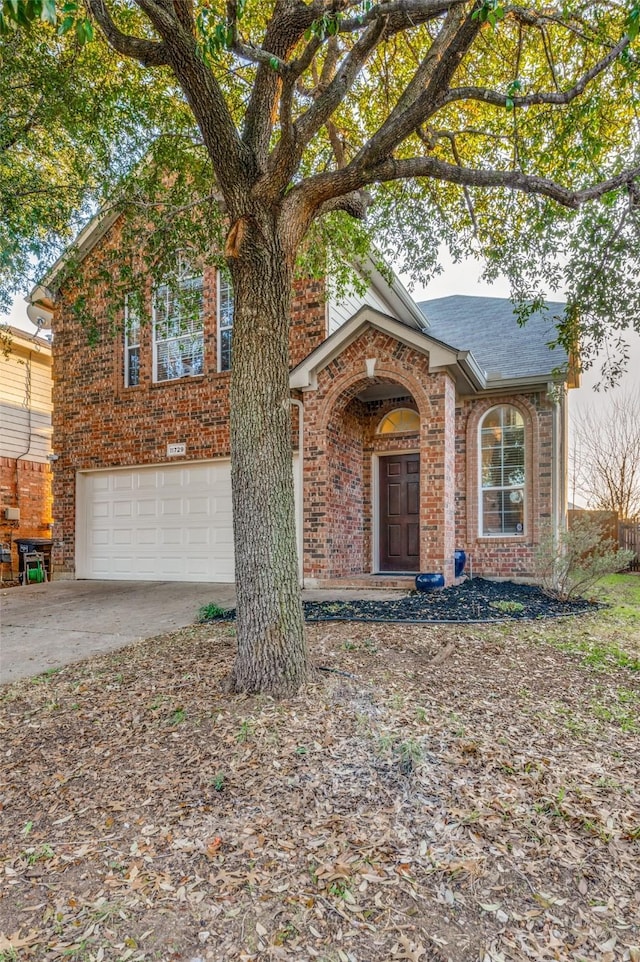 view of front of property with a garage