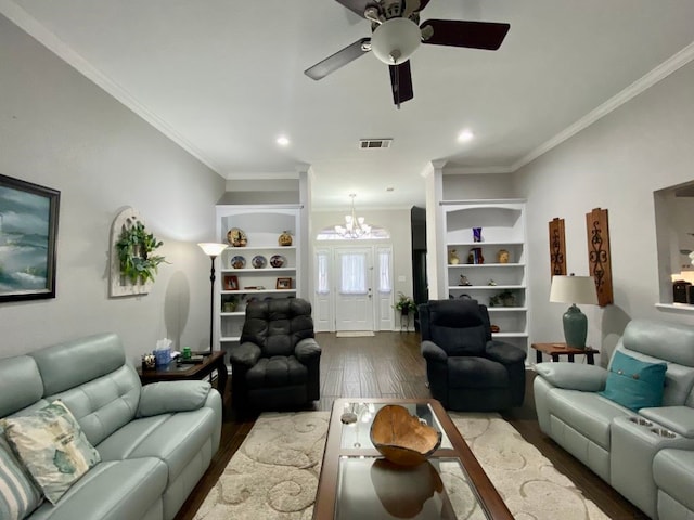 living room with hardwood / wood-style flooring, ceiling fan with notable chandelier, and ornamental molding