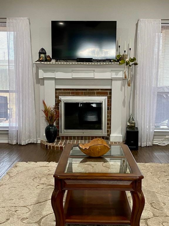 interior space featuring a fireplace and hardwood / wood-style floors