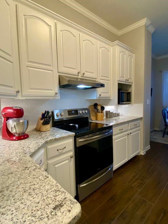 kitchen featuring white cabinetry, crown molding, stainless steel electric range oven, dark hardwood / wood-style flooring, and light stone countertops