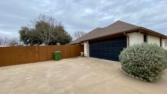 view of home's exterior with a garage