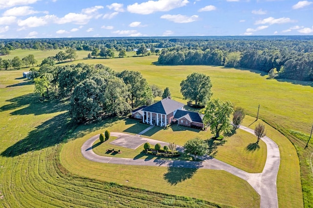 birds eye view of property with a rural view