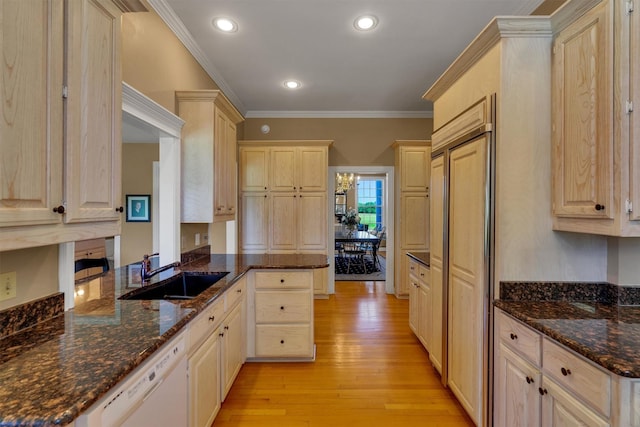 kitchen featuring sink, dark stone counters, white dishwasher, kitchen peninsula, and light wood-type flooring
