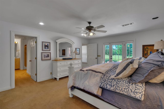 bedroom featuring access to exterior, light colored carpet, and ceiling fan