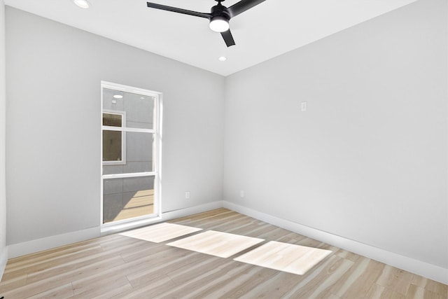 unfurnished room with light hardwood / wood-style floors and ceiling fan