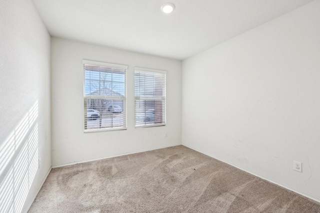 empty room featuring carpet floors