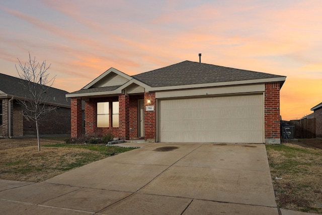 ranch-style home with a garage