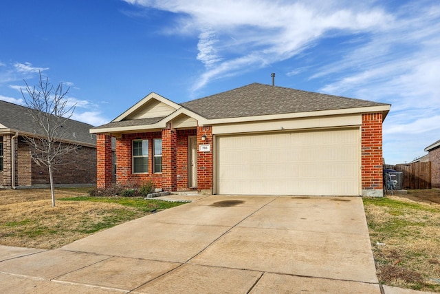 single story home featuring a garage