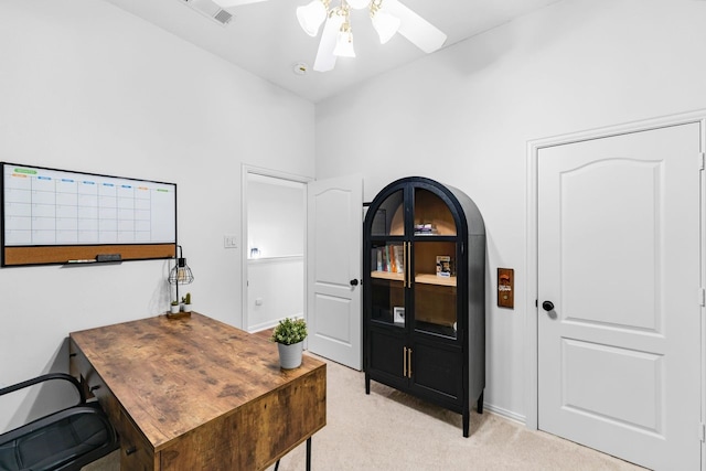 office area featuring light colored carpet and ceiling fan