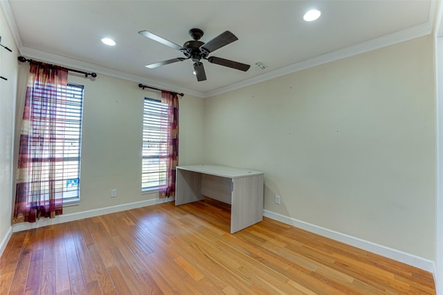 empty room with ornamental molding, ceiling fan, and light hardwood / wood-style flooring