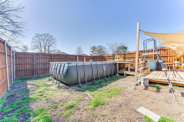 view of yard featuring a pool side deck