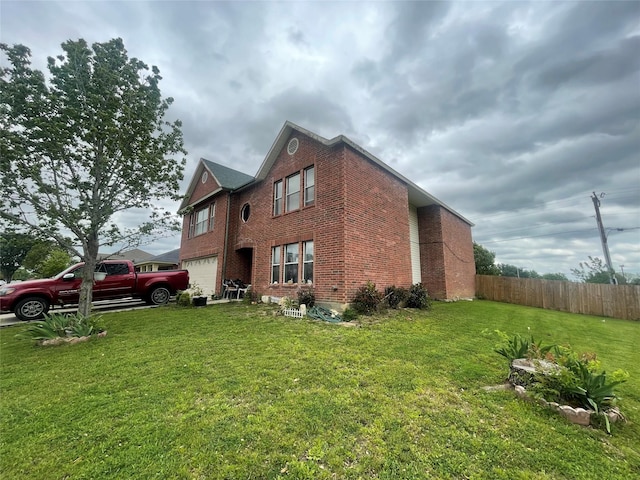 view of side of home featuring a garage and a yard