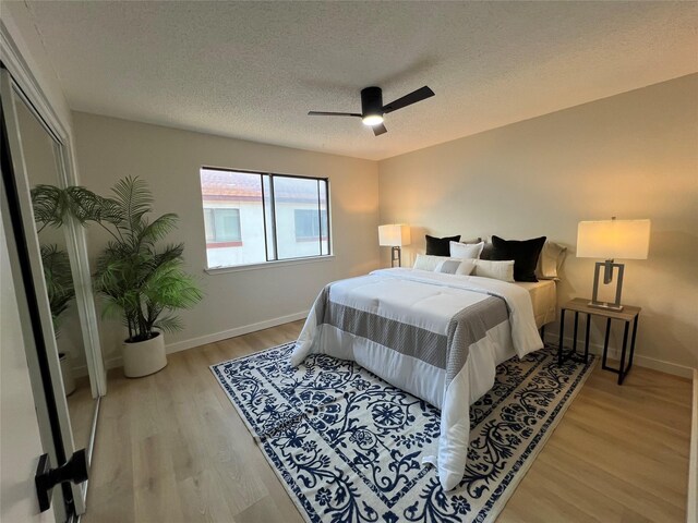 unfurnished room with ceiling fan, carpet flooring, a textured ceiling, and vaulted ceiling with beams