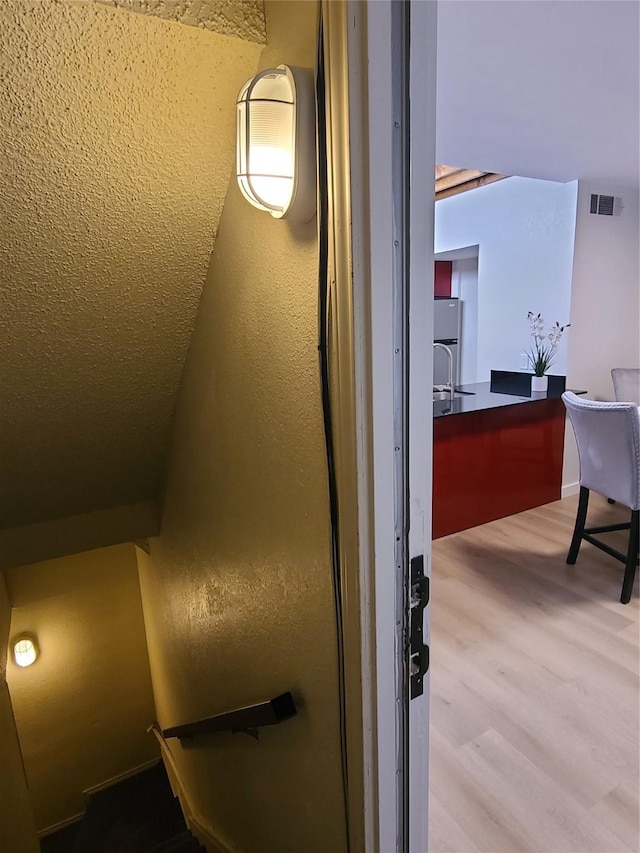 interior space featuring hardwood / wood-style flooring and sink