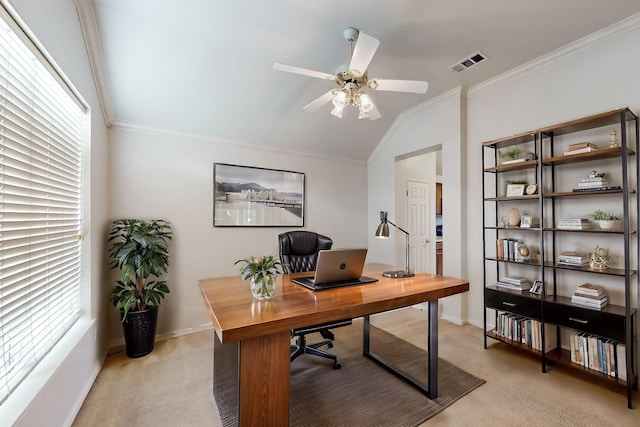 carpeted office space with crown molding, ceiling fan, and vaulted ceiling