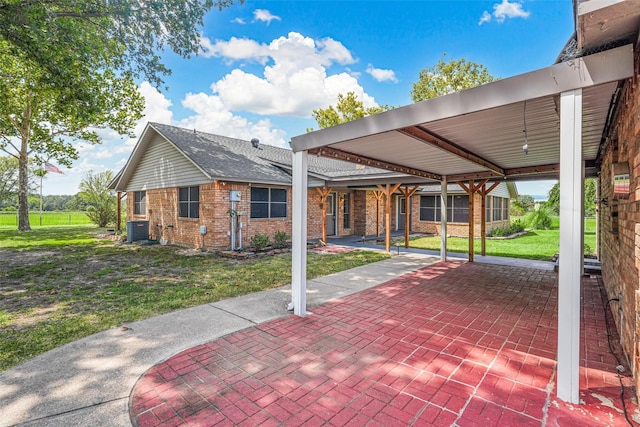 view of patio / terrace featuring a carport and central AC unit