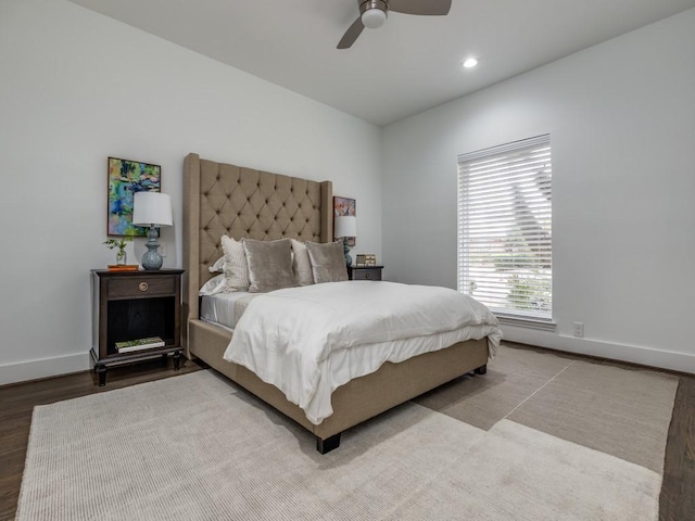 bedroom featuring ceiling fan and light hardwood / wood-style floors