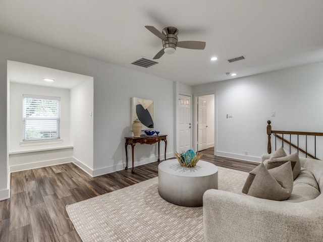 sitting room featuring ceiling fan and wood-type flooring