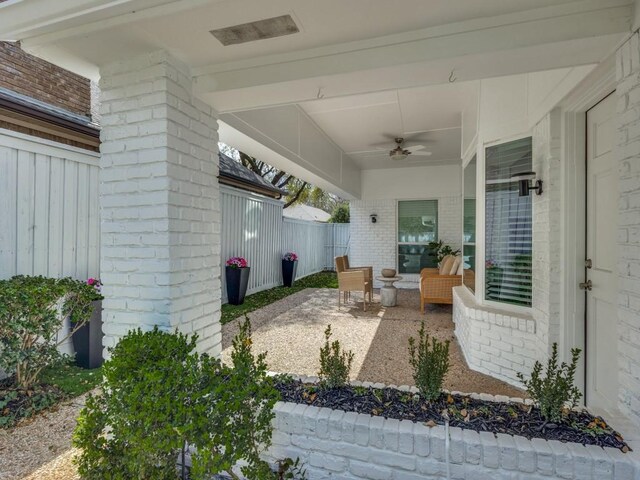 view of side of property featuring central AC, a garage, and a yard