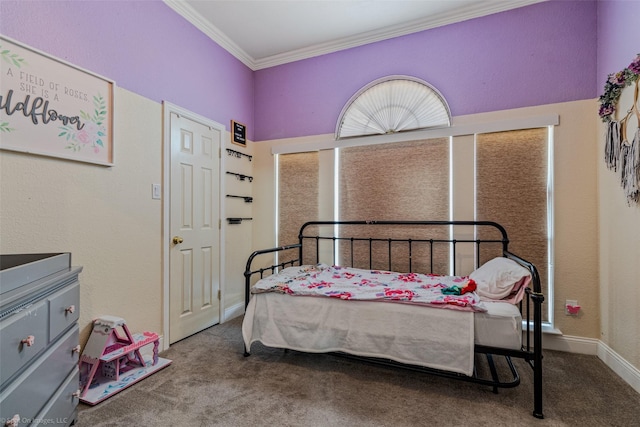 bedroom with ornamental molding and carpet