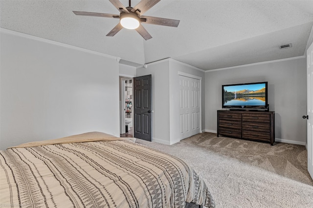 bedroom featuring crown molding, light colored carpet, ceiling fan, and a textured ceiling