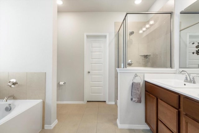 bathroom featuring vanity, tile patterned floors, and independent shower and bath